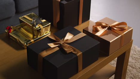 Close-Up-Of-Gift-Wrapped-Presents-On-Table-In-Lounge-At-Home-6